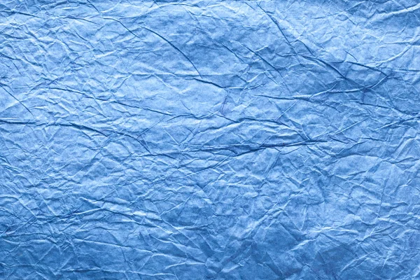 Bild konsistens av skrynkligt blå papper. — Stockfoto