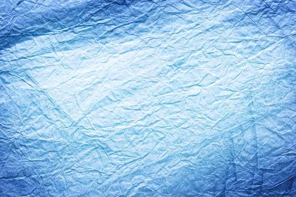 Изображение текстуры смятой голубой бумаги . — стоковое фото