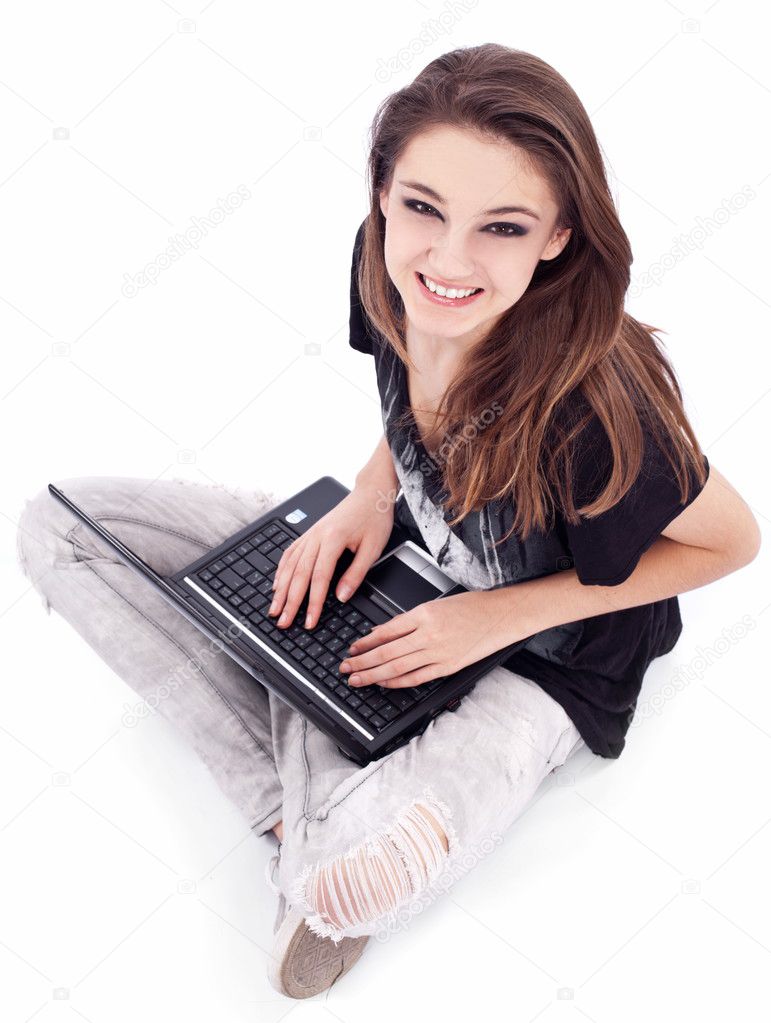 Girl working with laptop. Picture on a white background.