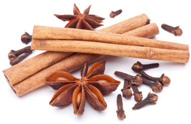 Cloves, anise and cinnamon isolated on white background. clipart