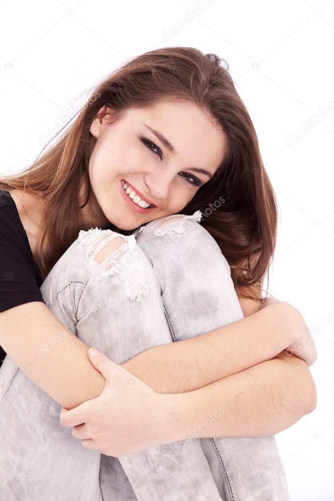 Teenager girl on a white background.