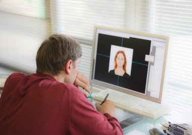 Young guy behind a computer