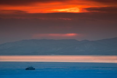 dondurulmuş deniz Crimson sunset