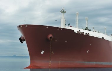 Bow of an anchored liquefied gas carrier clipart