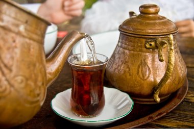 Drinking Traditional Turkish Tea With Friends clipart