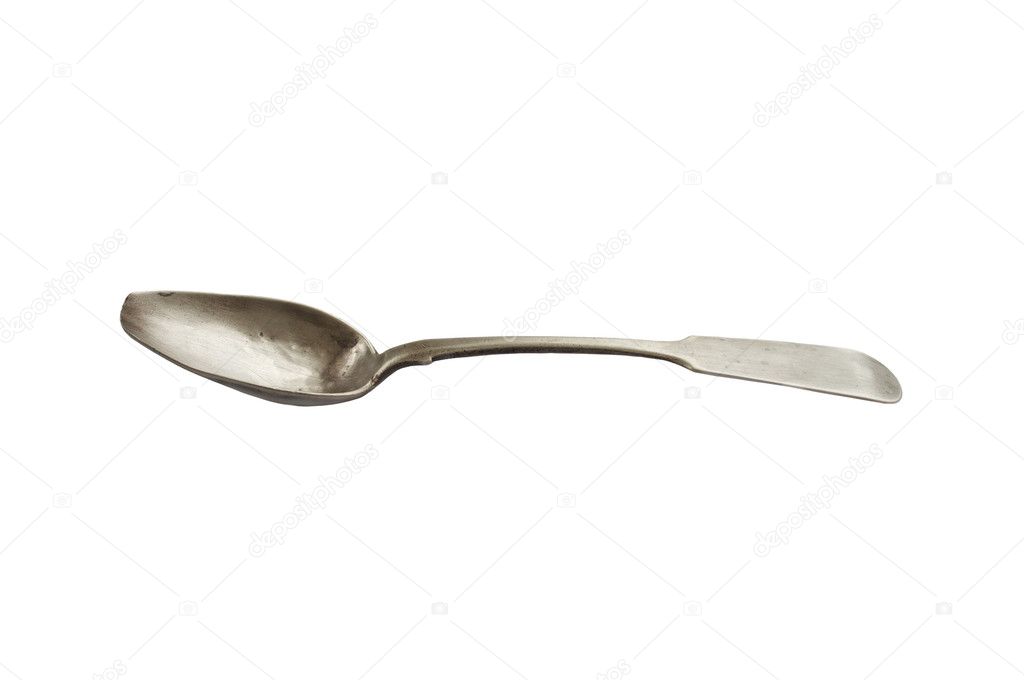 Silver vintage spoon isolated over white background