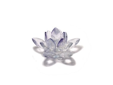 Crystal in form of lotus flower with shadow over white clipart