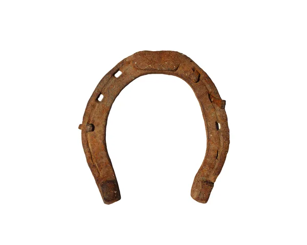 Antigua herradura oxidada con clavo aislado sobre fondo blanco — Foto de Stock