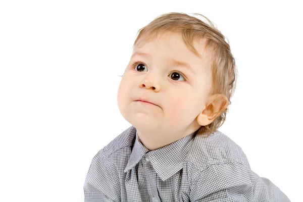 Pequeno Rapaz Com Interesse Olha Antes Mesmo Sobre Branco — Fotografia de Stock
