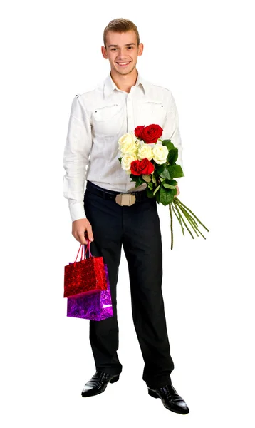 Young Man With Rose and shopping bag — Stock Photo, Image