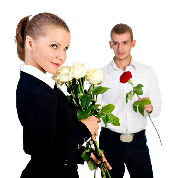 若い男性と女性の花を持つ — ストック写真