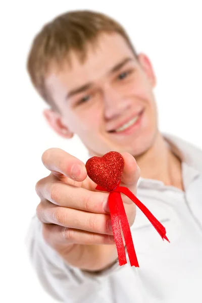 Ung Man Håller Hjärtat Handen Han Ger Det Någon Isolerad — Stockfoto
