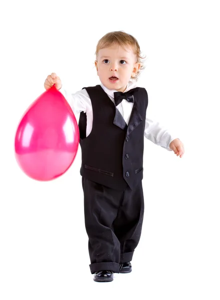 Baby boy in age one year holding balloon — Stock Photo, Image