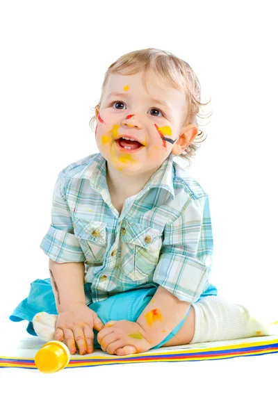 Hermoso bebé cubierto de pintura brillante — Foto de Stock