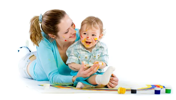 Young mum draws with the son paints — Stock Photo, Image