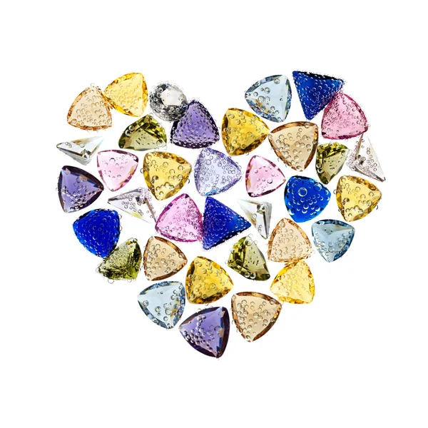 Šperky ve tvaru srdce drahokamy. izolované na bílém. — Stock fotografie