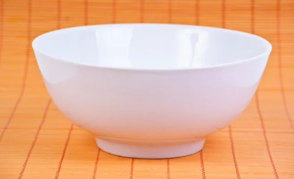 White Dish Orange Background — Stock Photo, Image