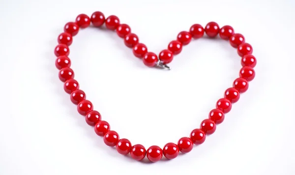 Des Perles Rouges Cadeau Sur Les Sélébrants — Photo