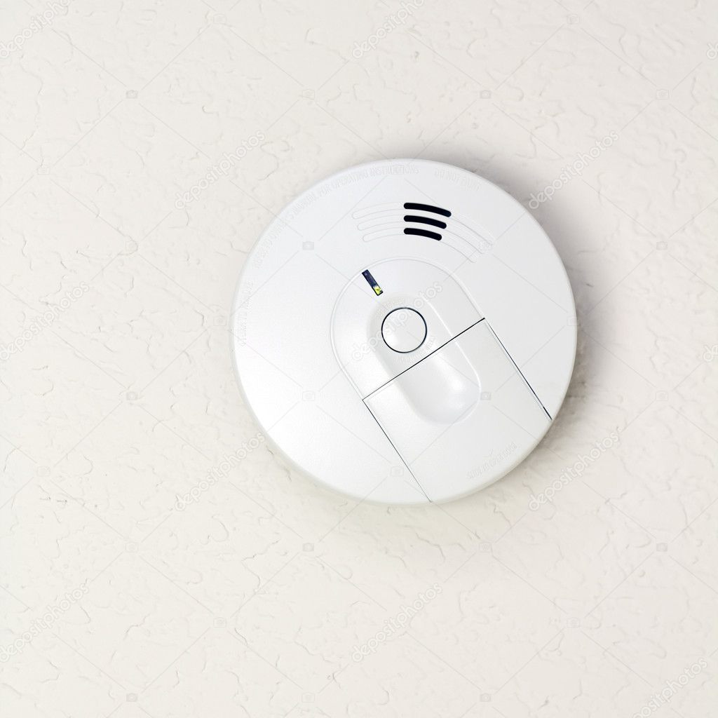 Small round battery operated device to warn residents of fire.