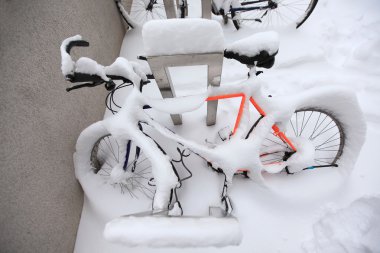 Mountain Bike Covered by a Lot of Snow clipart