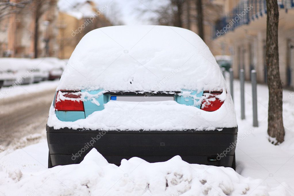 Car Covered by Snow