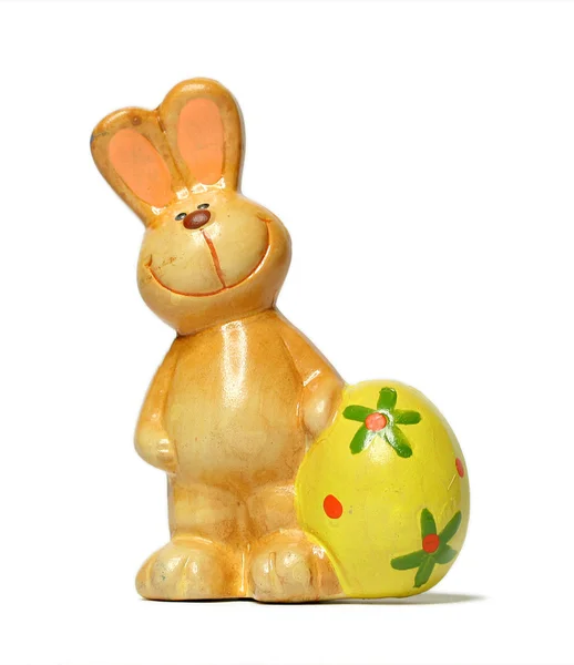 stock image Ceramic pottery easter bunny frontal with egg