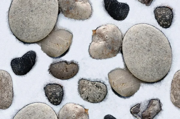 Χωρίς Ραφή Πρότυπο Του Χιονιού Και Ομαλή Στρογγυλεμένες Πέτρες — Φωτογραφία Αρχείου