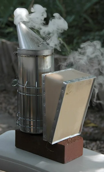 stock image Traditional smoker still used by beekeepers to calm the bees.