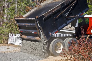 Large Truck Dumping Gravel clipart
