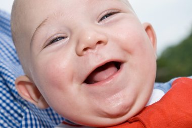 A Cute Baby Laughing clipart