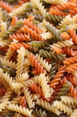 A pile of the colorful italian raw pasta clipart