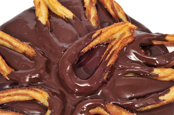 Churros con čokoláda, typické španělské sladký snack — Stock fotografie