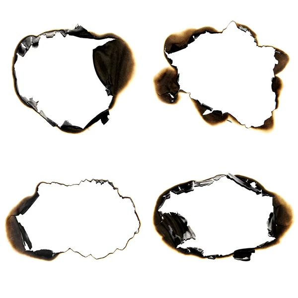 Burned holes — Stock Photo, Image