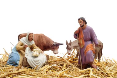 Figures representing nativity scene on white background clipart