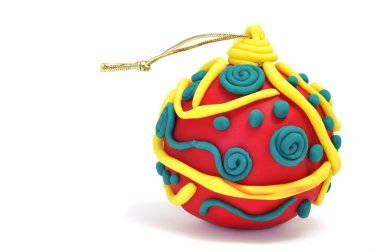 A christmas ball made with modelling clay on a white background clipart