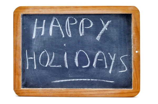 Gelukkige vakantie geschreven met krijt in een schoolbord — Stockfoto
