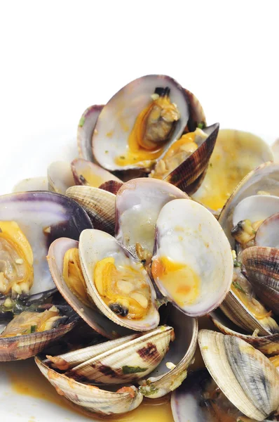 Молюски в соусі з маринари — стокове фото