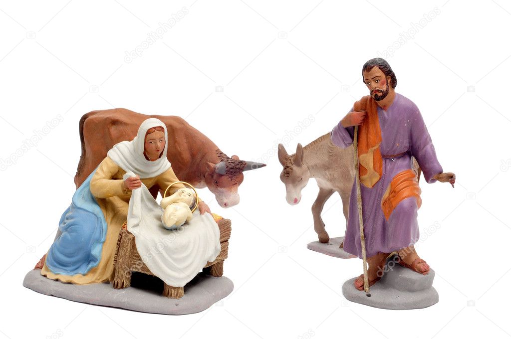 Figures representing nativity scene on white background