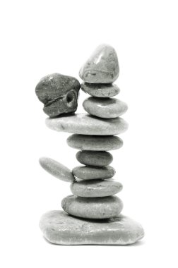 A pile of zen stones on a white background clipart