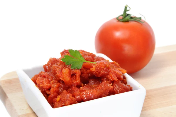 Stock image A bowl of spanish sofrito, made with tomatoes, onion and garlic