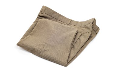 Folded trousers isolated on a white background clipart