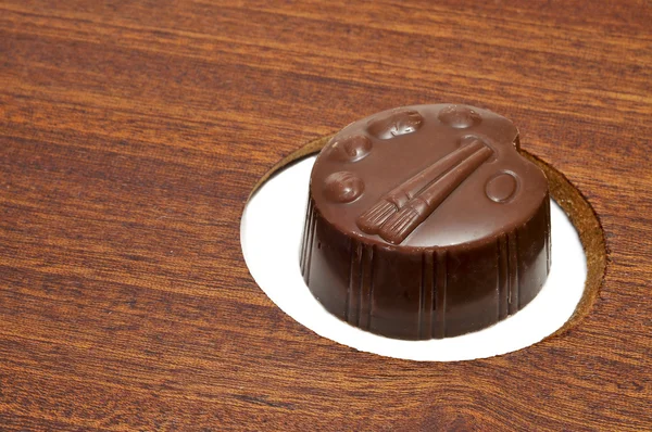 Cioccolato Forma Tavolozza Nel Foro Una Tavolozza Legno — Foto Stock