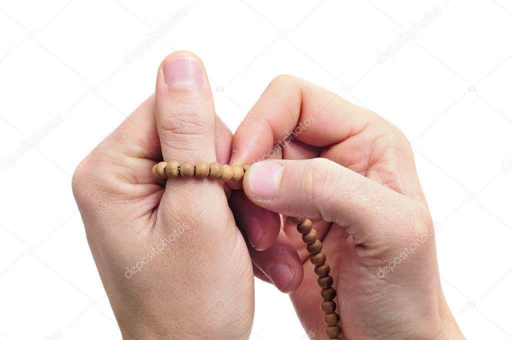 Images: image of someone praying | Someone praying with a rosary