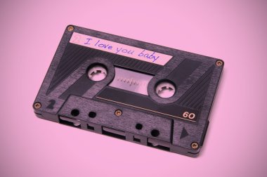 I love you baby written in the label of a cassette tape clipart