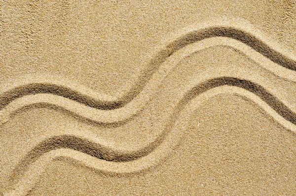 Ein Wellenförmiges Design Das Den Sand Gezeichnet Wurde — Stockfoto