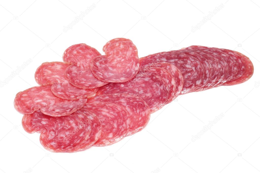 A pile of salchichon, red spanish salami, on a white background