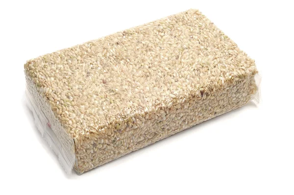 Beyaz Bir Arka Plan Üzerinde Izole Kahverengi Pirinç Bir Torba — Stok fotoğraf