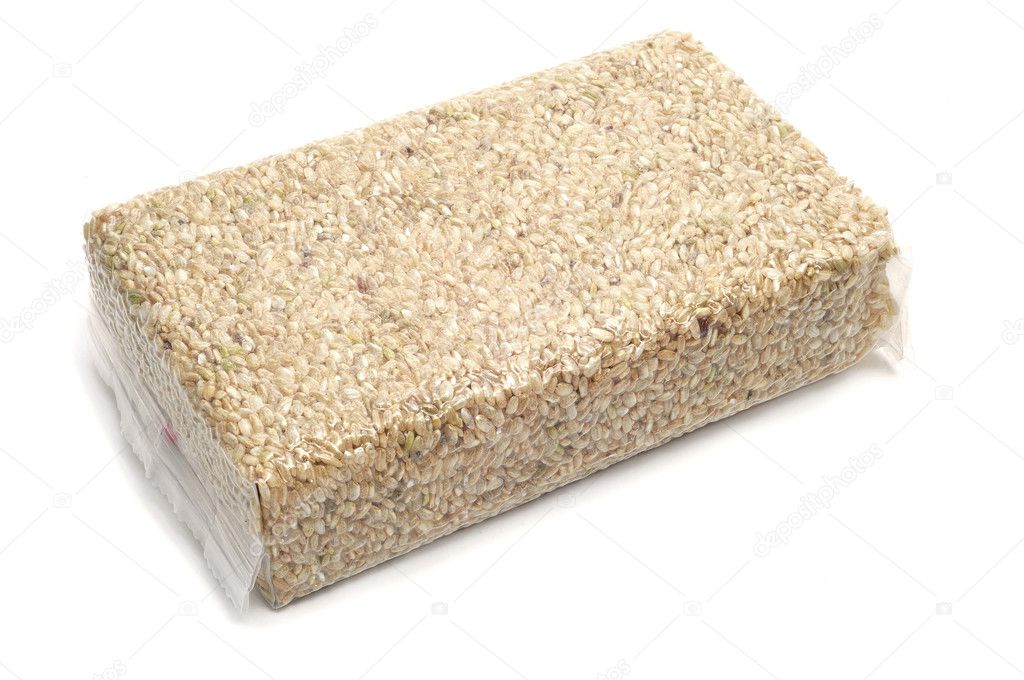 A bag of brown rice isolated on a white background