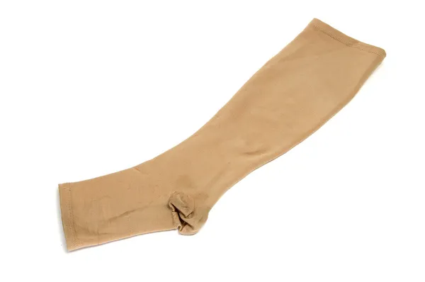 Beyaz Bir Arka Plan Üzerinde Izole Bir Sıkıştırma Çorap — Stok fotoğraf