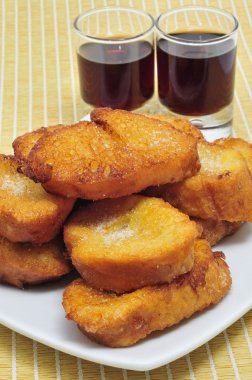 Torrijas, typical Lent spanish sweet, and moscatel clipart